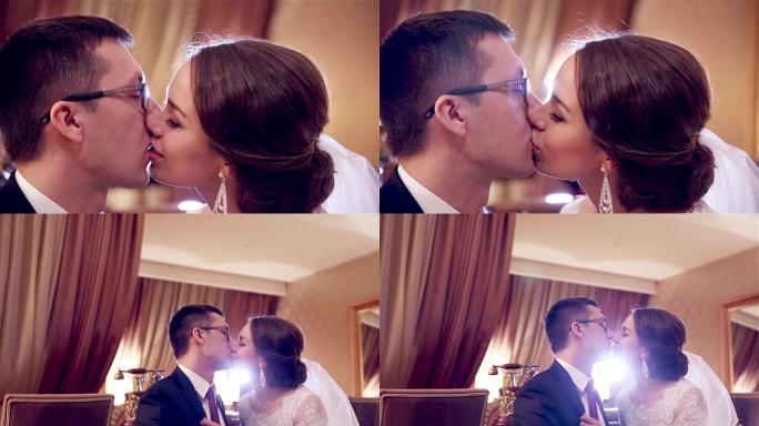 幸福的年轻夫妇甜蜜的吻