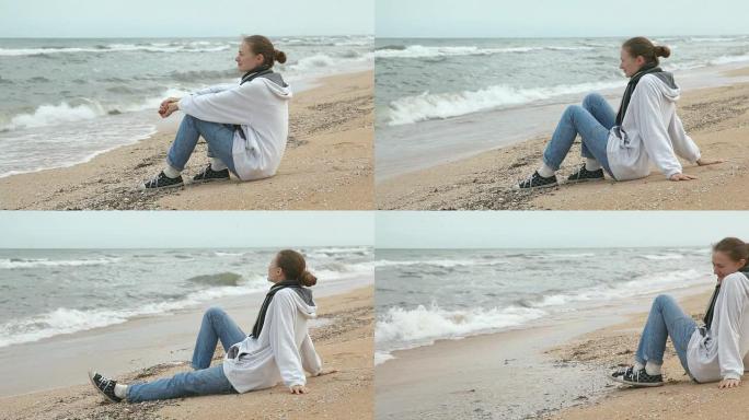绝望的年轻女子在海边等人