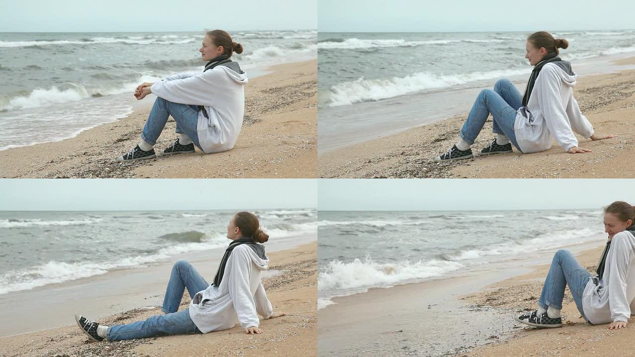 绝望的年轻女子在海边等人