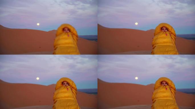 欣赏沙漠日落。寒冷的夜晚。满月。