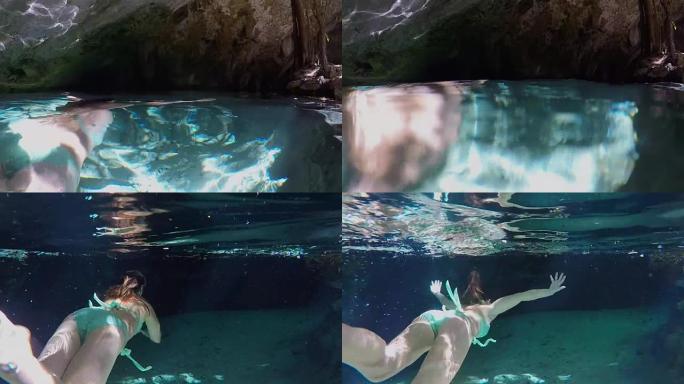 超龄少女cenote潜水雄伟的污水坑探索地下洞穴