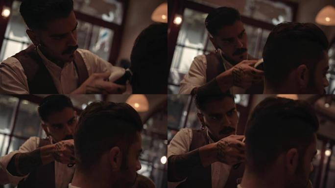 时尚的理发师给男人剪头发，给他时髦的发型