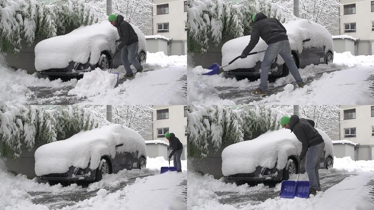 男子在车前铲雪