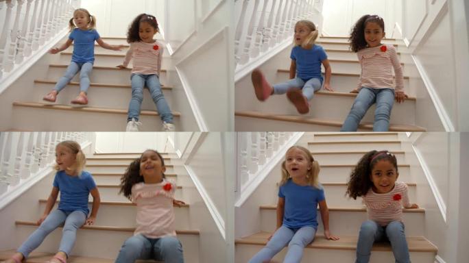 两个女孩在慢动作的楼梯上玩耍