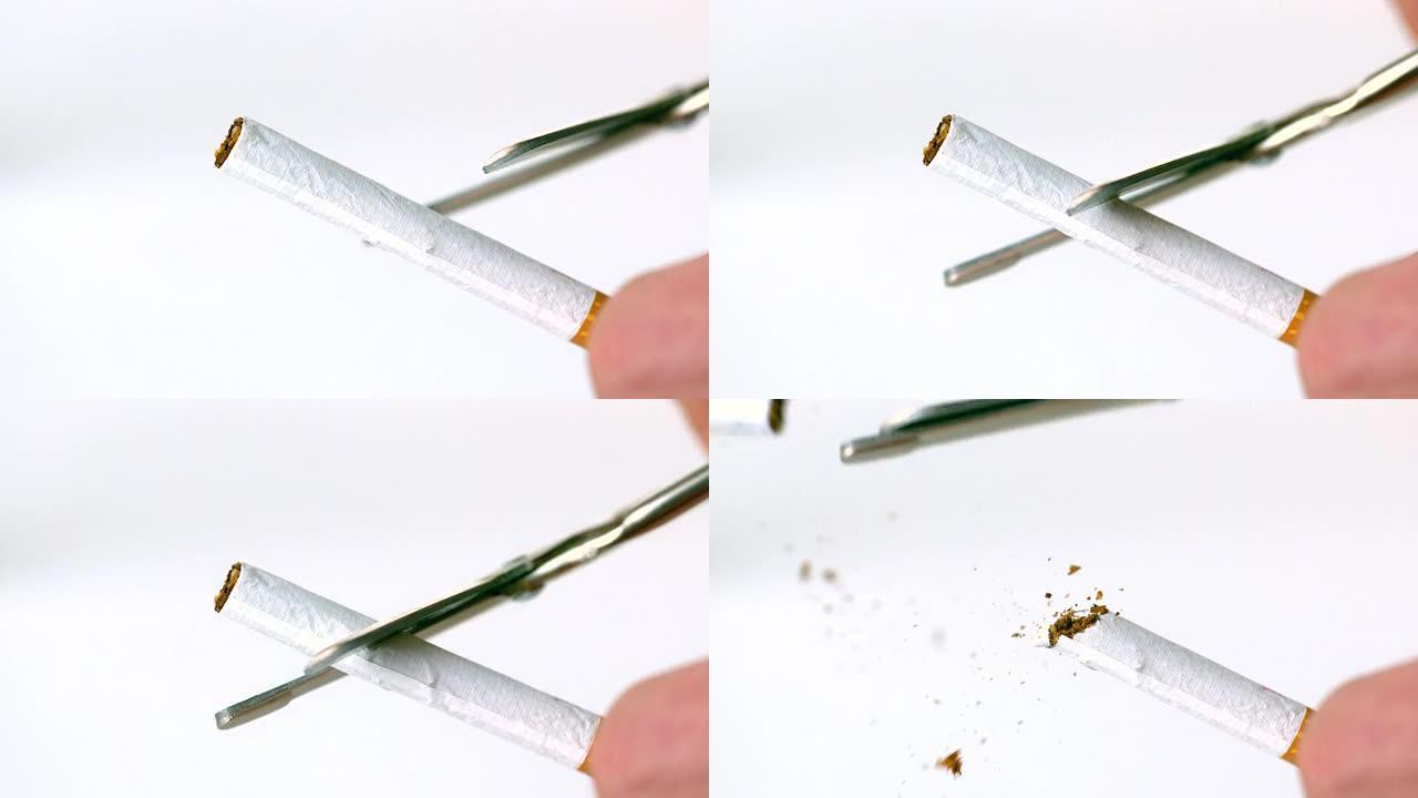 剪刀将香烟切成两半