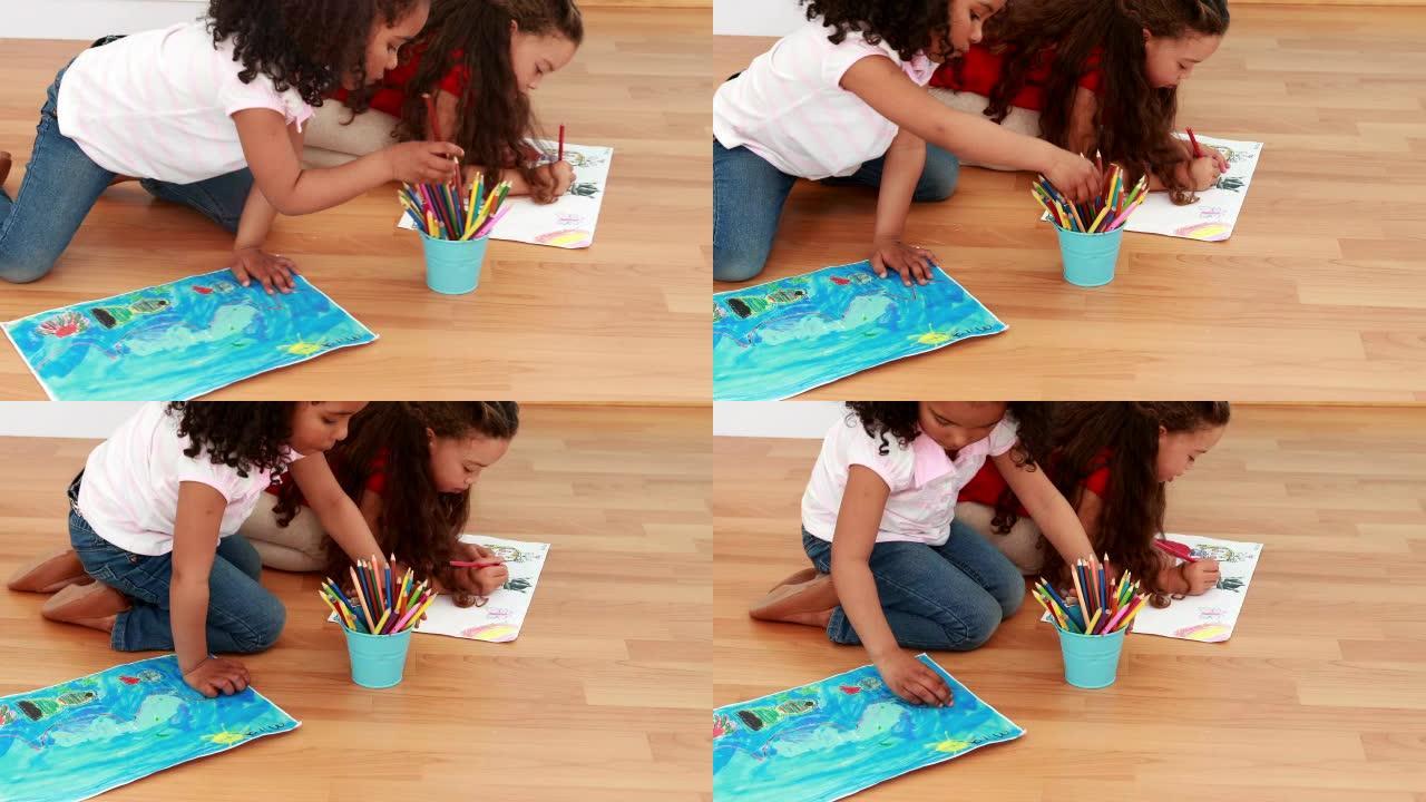 小孩子们在课堂上一起画画