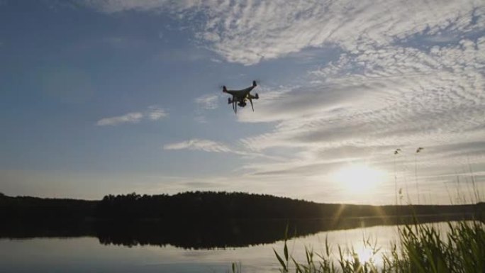 drone filming on a lake coast