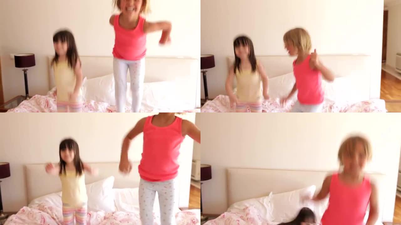 两个女孩在床上跳跃