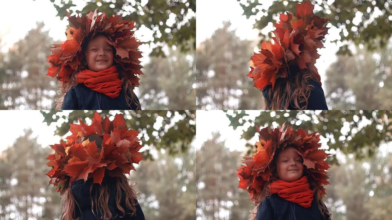 秋天枫叶花环皇冠上快乐微笑美丽可爱的小女孩的全高清特写肖像