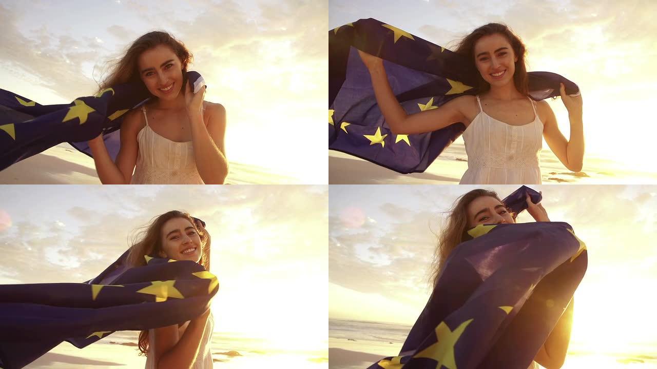 女人挥舞着欧洲国旗，对着镜头微笑