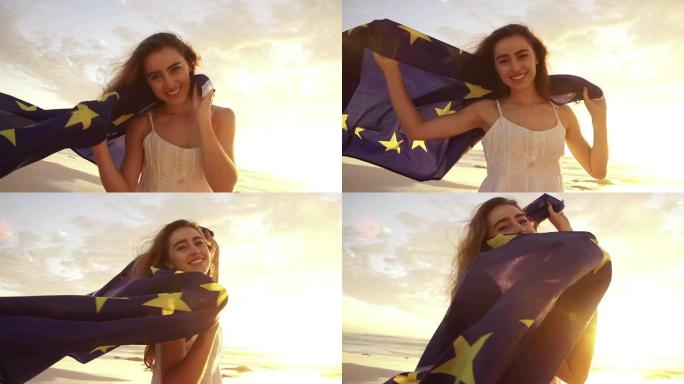 女人挥舞着欧洲国旗，对着镜头微笑