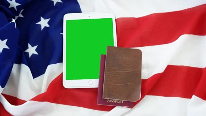 数码平板电脑，护照和美国国旗签证