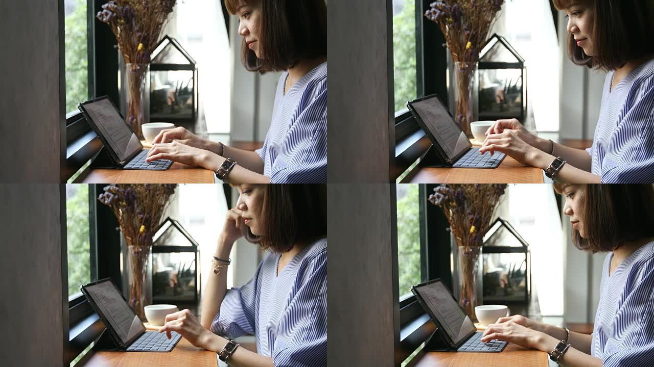 使用电脑笔记本电脑的亚洲女性