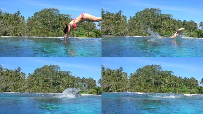 特写: 女孩在巴厘岛豪华丛林度假村的无边泳池跳跃和潜水