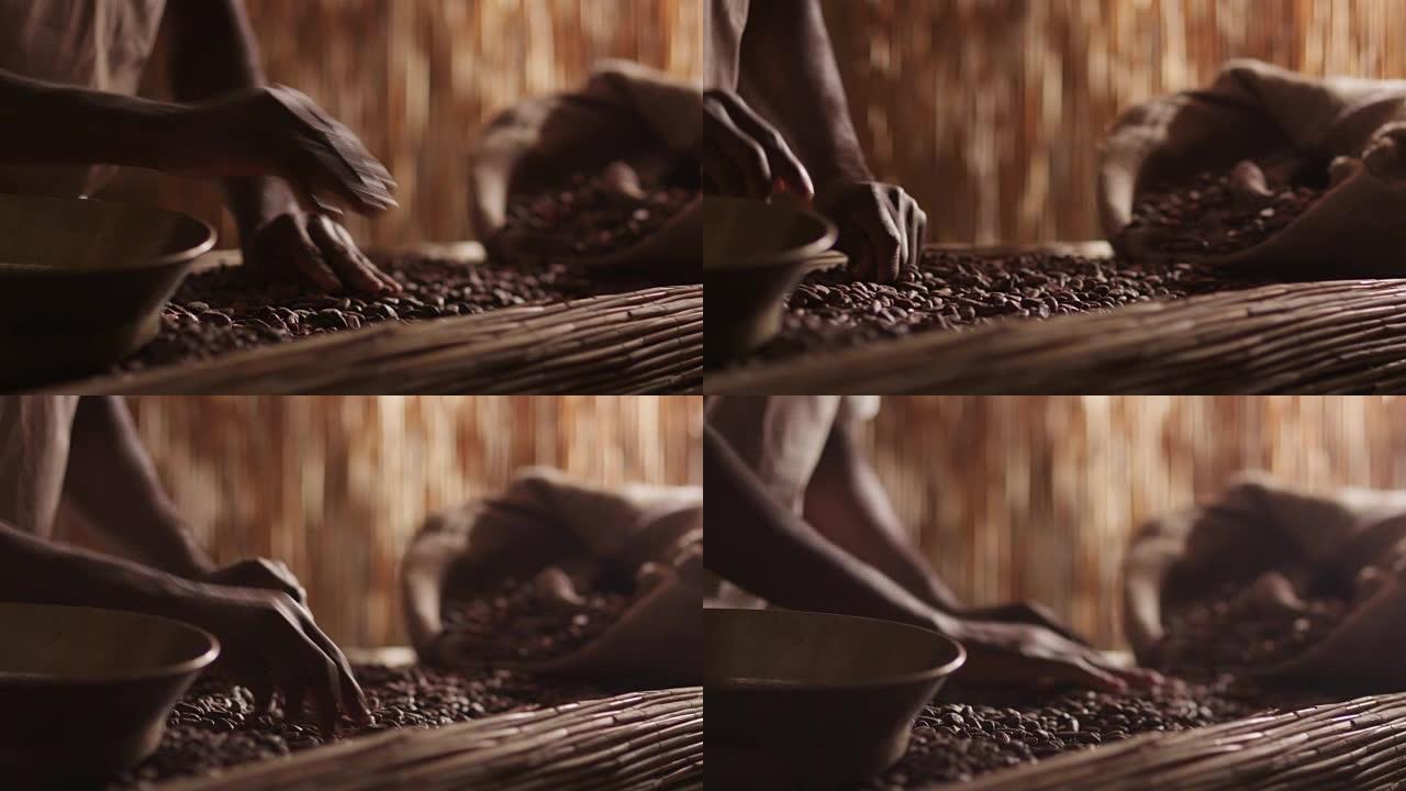 非洲工人正在分类咖啡豆。