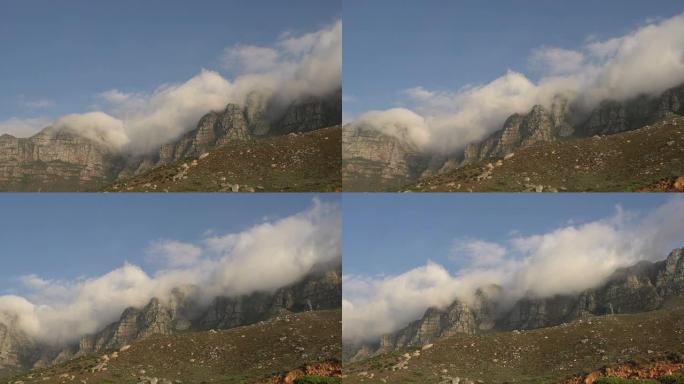 乌云笼罩着南非开普敦的12个使徒山脉