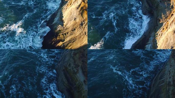 鸟瞰图揭示了太平洋西北地区岩石悬崖海岸线和惊人的日出光