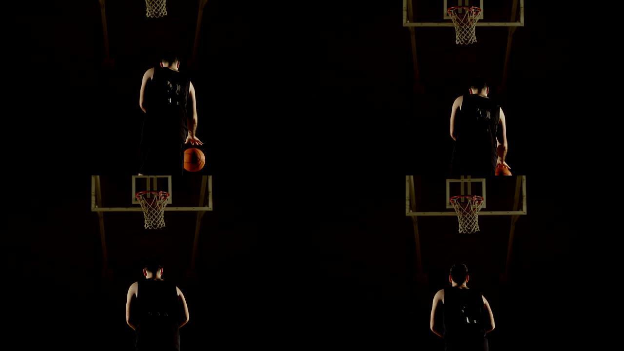 男子篮球运动员在篮球圈投掷篮球4k