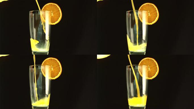 橙汁倒入玻璃杯中