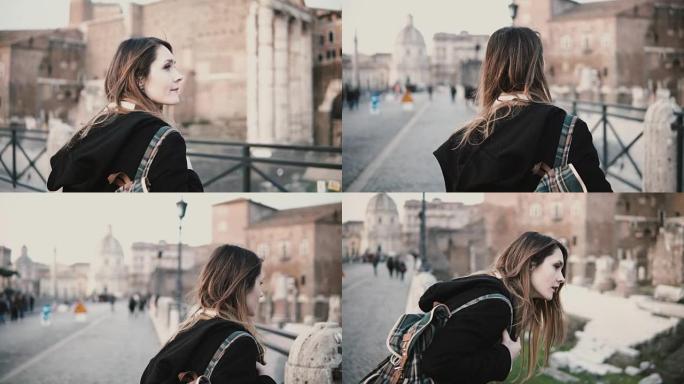 游客正在意大利罗马散步，穿过石桥，参观罗马广场。女孩看着桥下