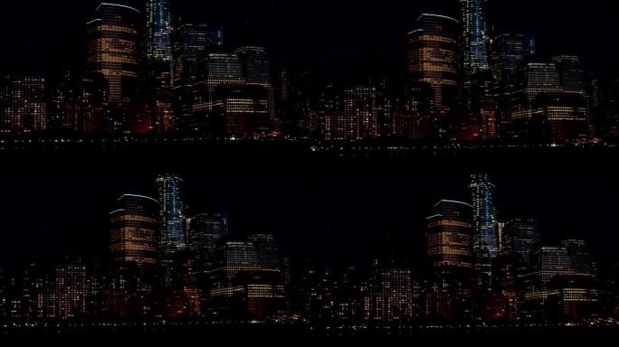 特写: 纽约市曼哈顿市中心在夜间被五颜六色的灯光照亮
