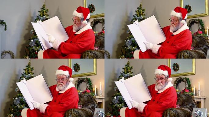 圣诞老人拿着一本书