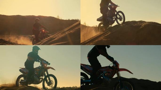 低角度拍摄的职业摩托车越野赛摩托车骑手站在道路上的越野。这是日落。