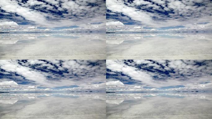 玻利维亚乌尤尼盐湖的天空对水的反射