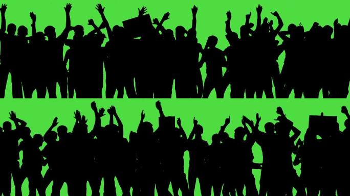 一群粉丝在绿屏上跳舞。音乐会，跳跃，跳舞，举起手来