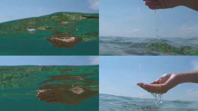 水下慢动作分裂: 手捞水，水滴落在海面上