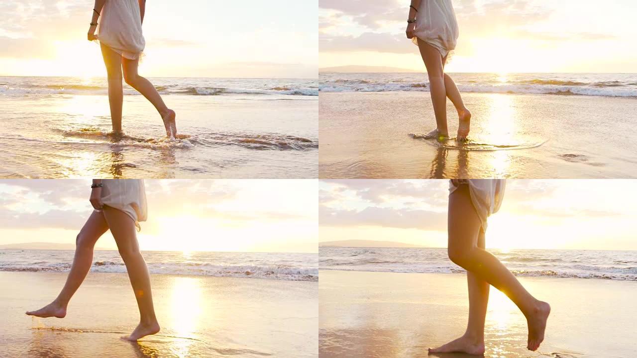 腿脚美丽的女孩赤脚走在湿沙热带岛屿海滩日落