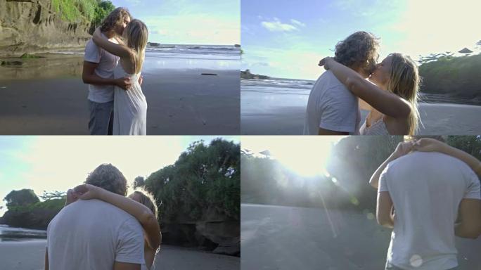 夫妇在海滩上轻轻接吻