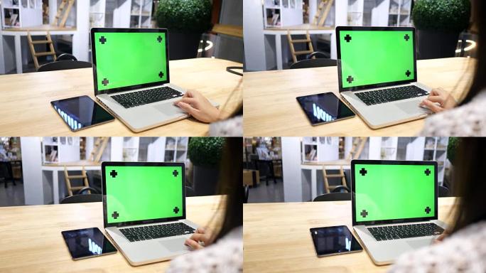 咖啡店的笔记本电脑绿屏