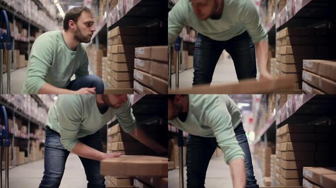 一名男子正在寻找必要的包裹，将它们从仓库的纸箱中取出。