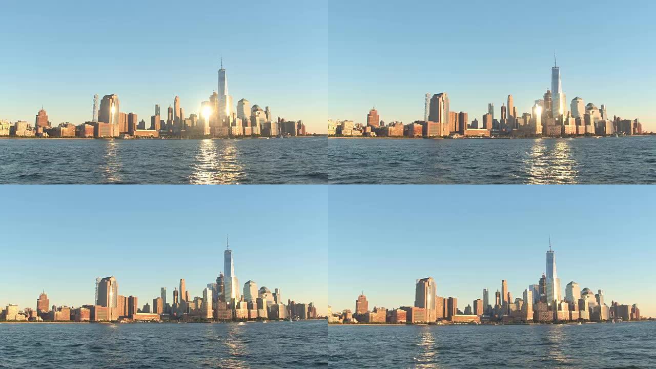 纽约市标志性玻璃状摩天大楼的窗户困住了闪闪发光的夕阳