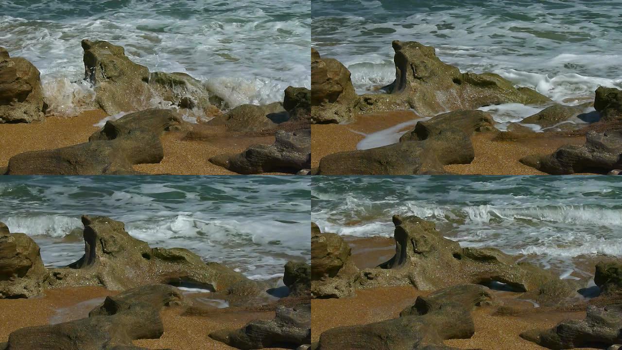 巨石上的冲浪特写大海边浪花海岛拍打石头礁