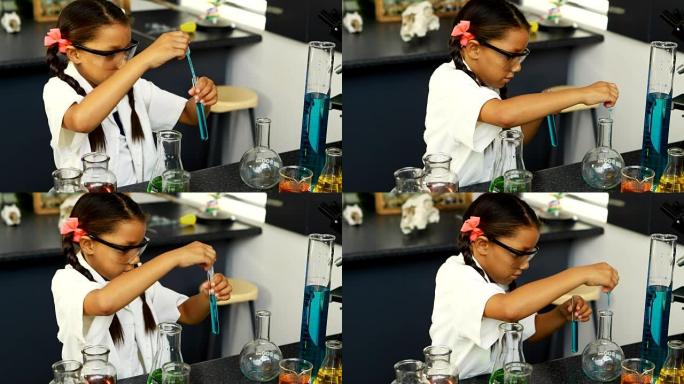 小学生在实验室4k中检查化学物质