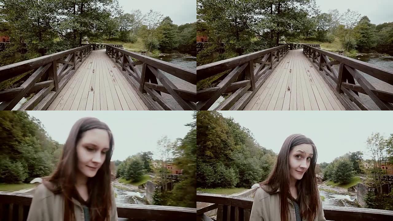 从木桥切换到一个美丽的年轻女子对着镜头眨眼的脸的视图