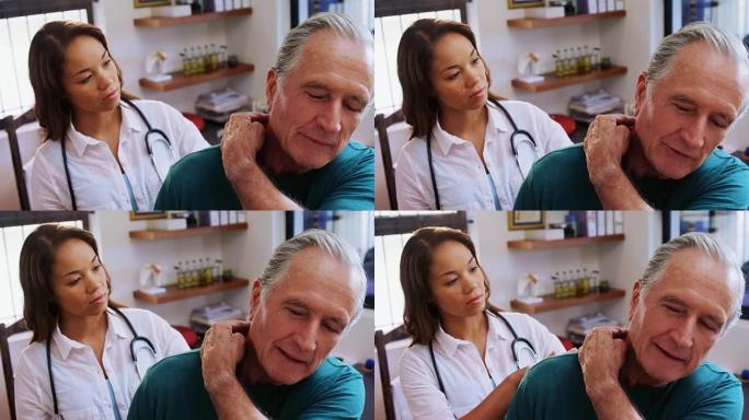 接受理疗师4k颈部按摩的高级男子