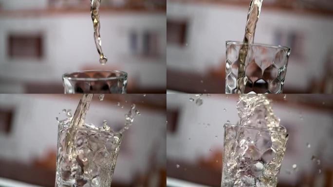 冷的纯净水倒入玻璃中。超级慢动作