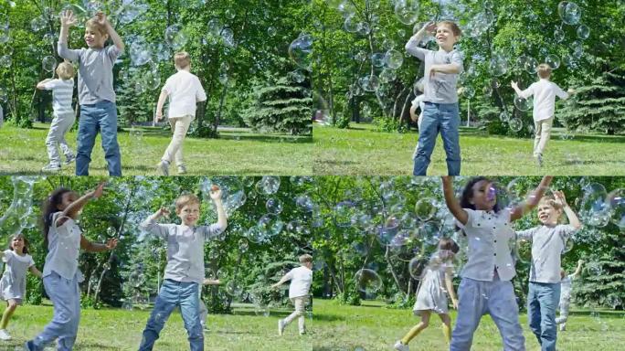 孩子们在公园的绿色草坪上追逐泡泡