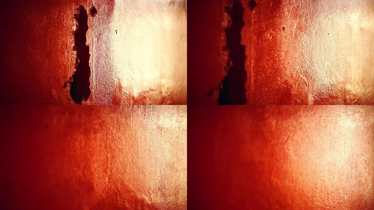 红色破裂的墙。特写