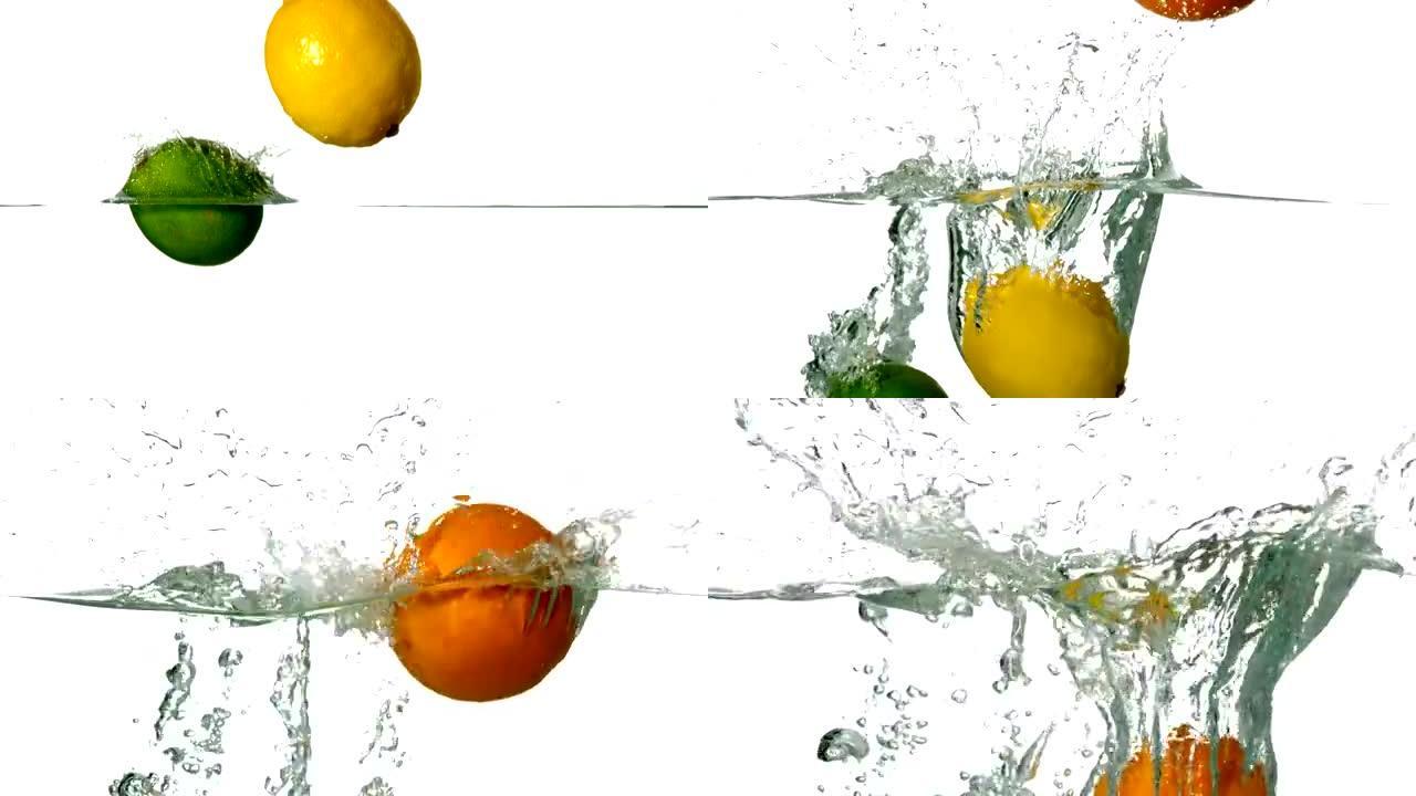 石灰柠檬和橙色在白色背景下陷入水中