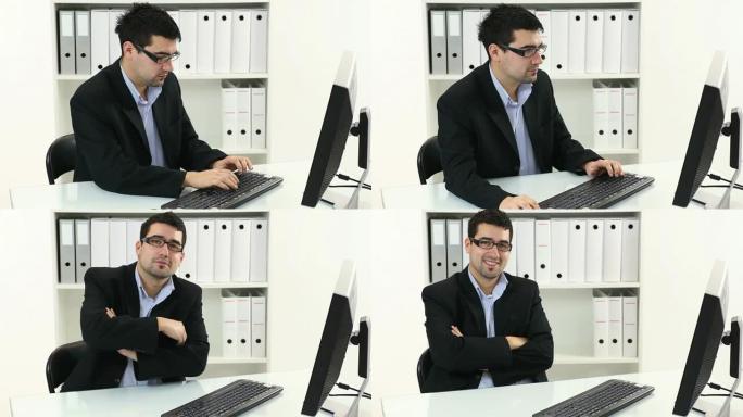 在办公室工作的年轻商人