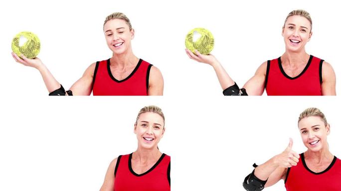 微笑的女运动员打手球