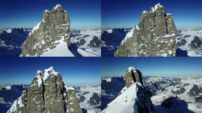 Establishing shot of snowy mountain top landscape 