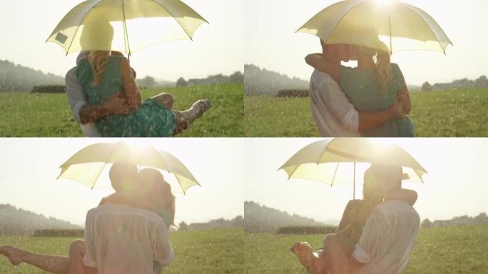 慢动作: 在凉爽的夏日雨中跳舞时拥抱年轻夫妇的亲吻。