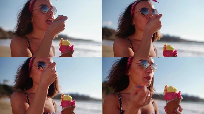 年轻女子在海滩上吃冰淇淋