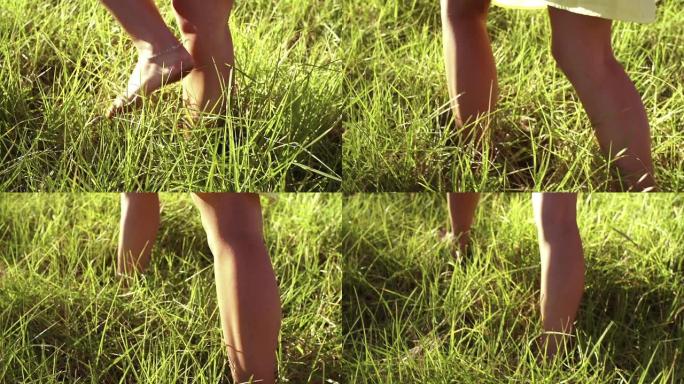 女孩在草地上行走