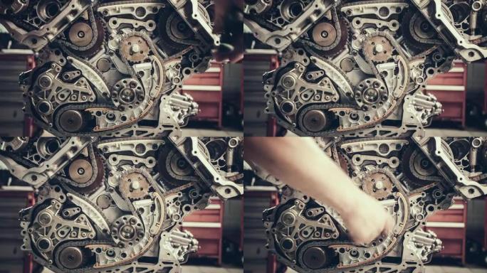 Professional mechanic repairing V10 engine in auto